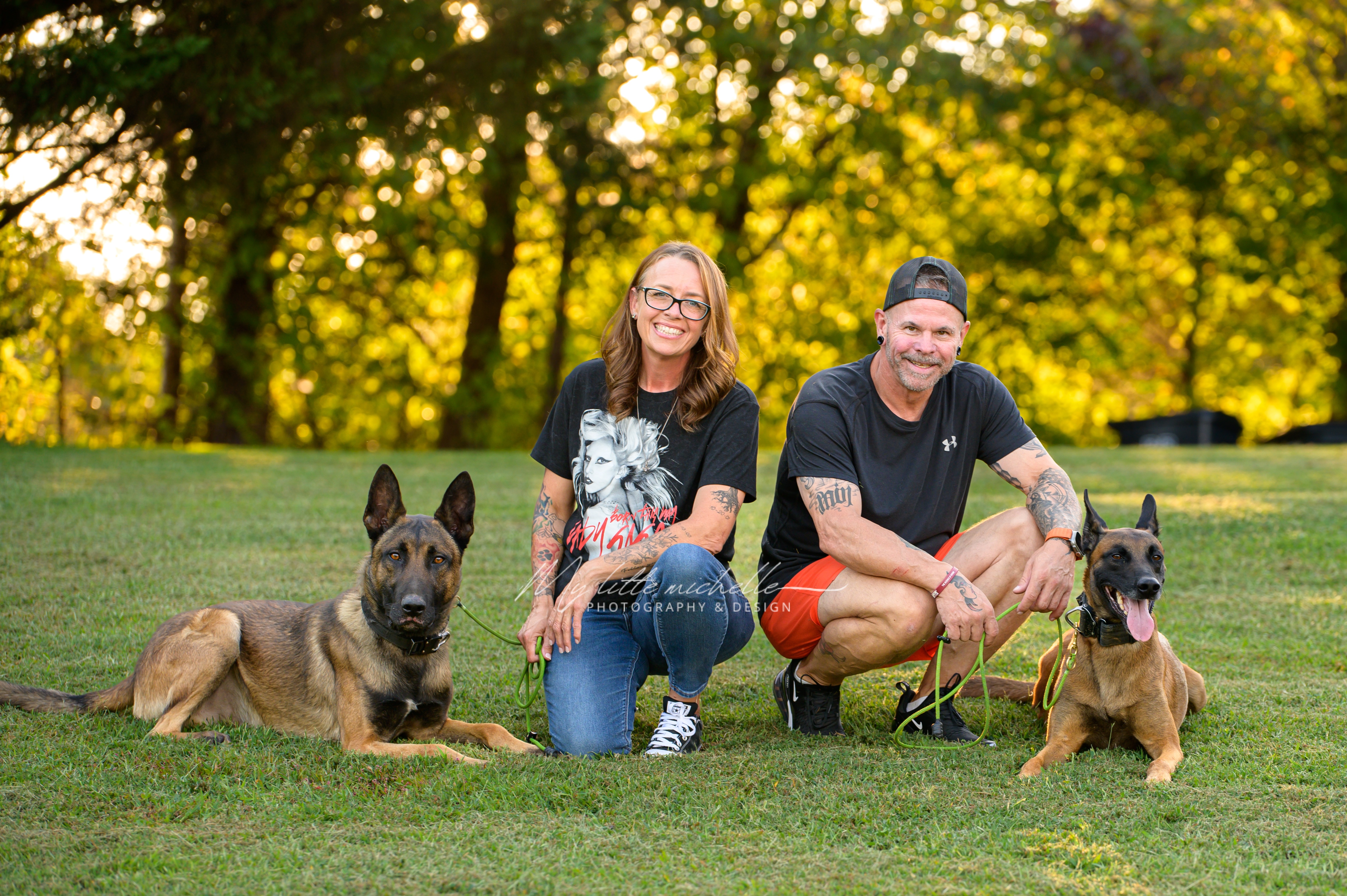 Maddie and David Van Fleet with their Belgian Malinois Gilbert and Grimm